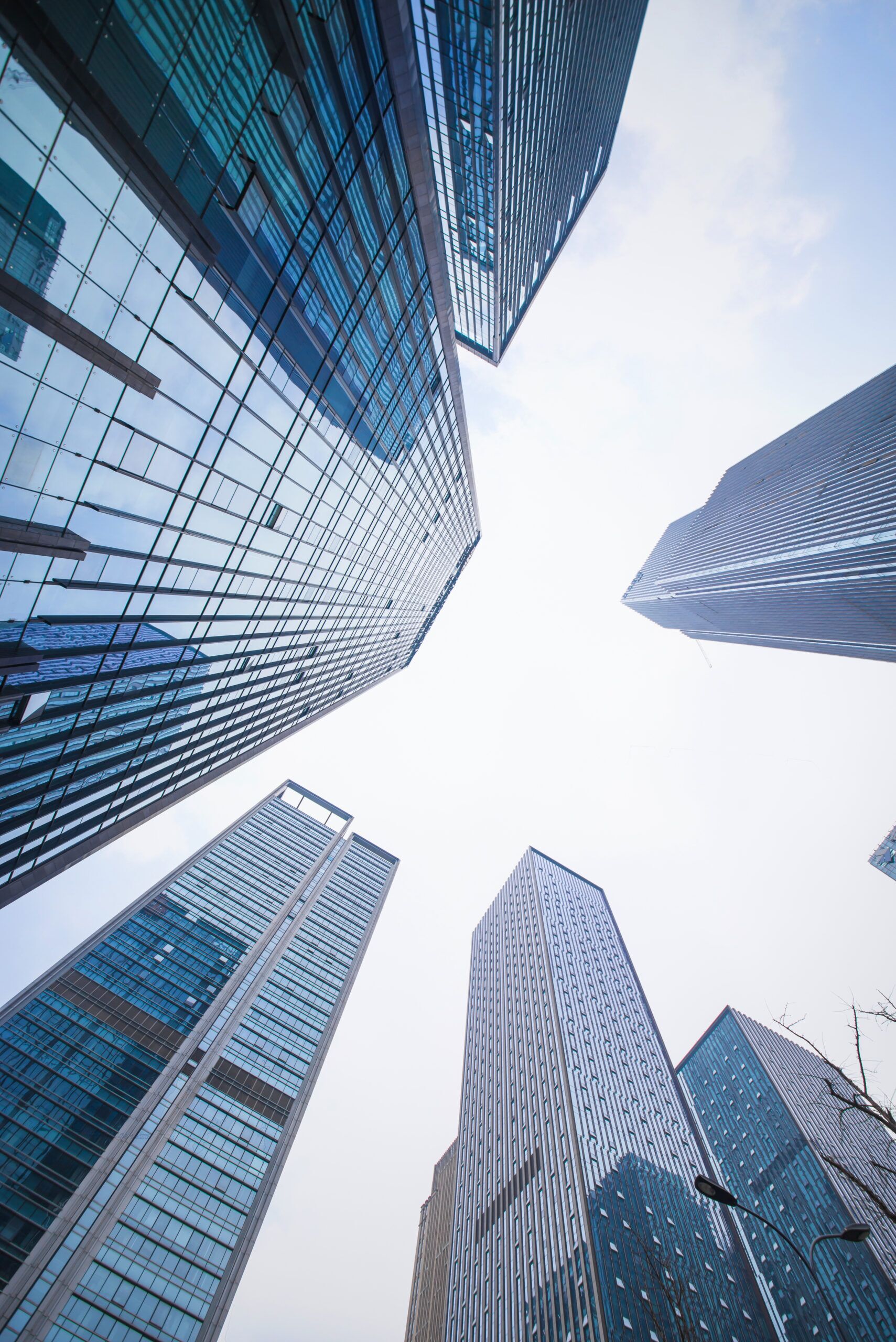 Looking up at business buildings
